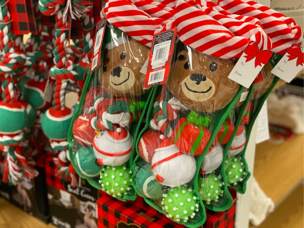 dog toys in stocking hanging in store