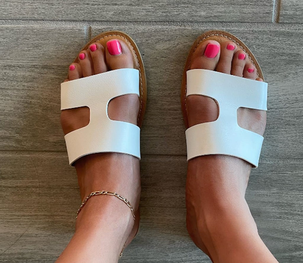 feet with white sandals 