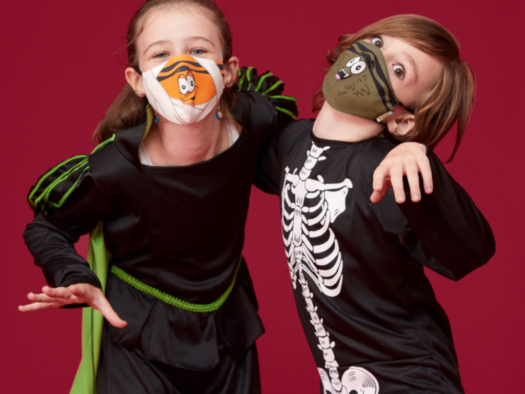 girl and boy wearing Halloween tip Crayola kids masks