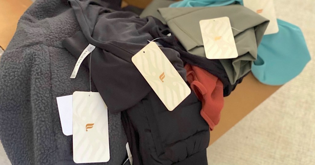 fabletics clothing with tags showing