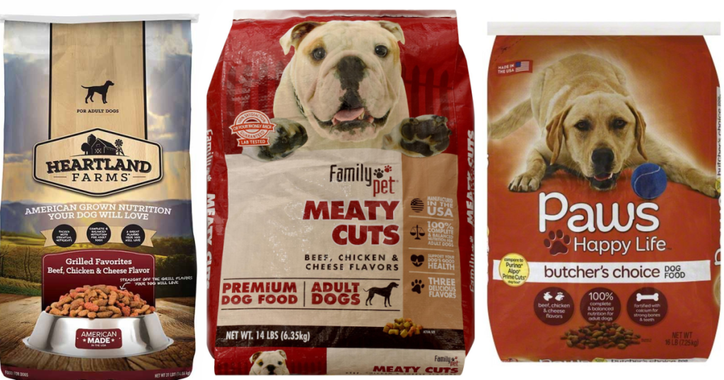three bags of unopened dog food on white background