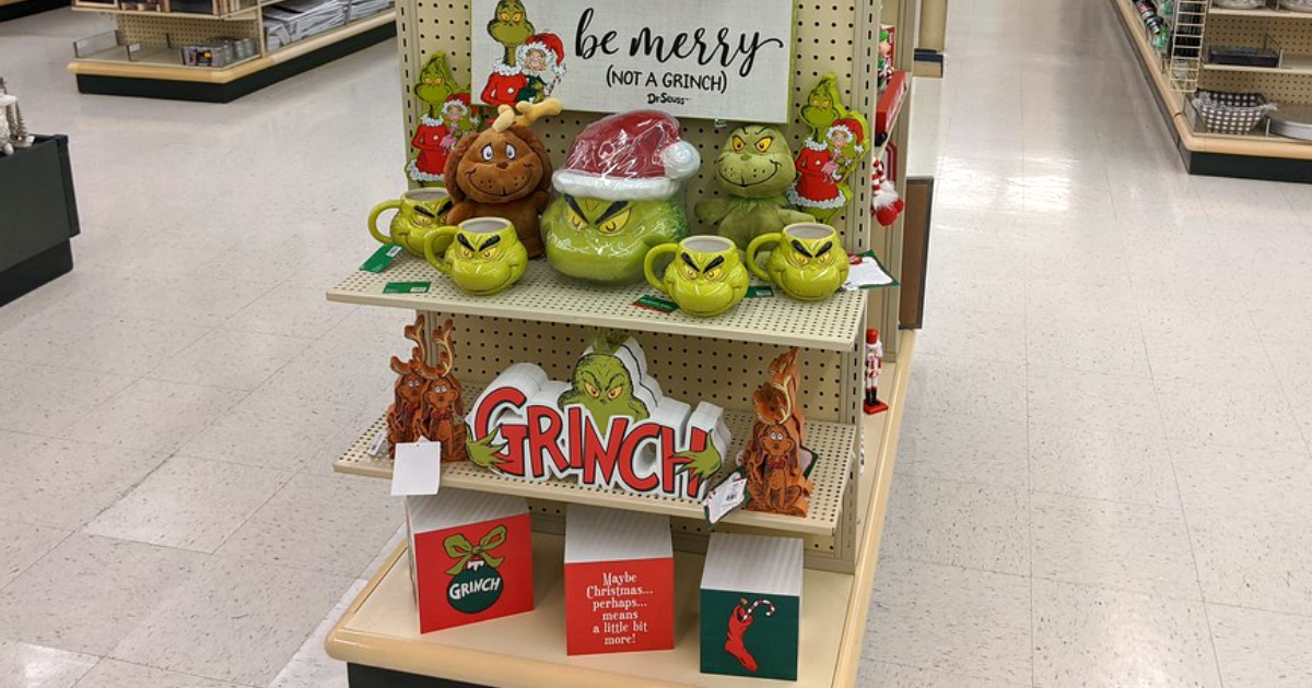 grinch decor and mugs on display in hobby lobby store