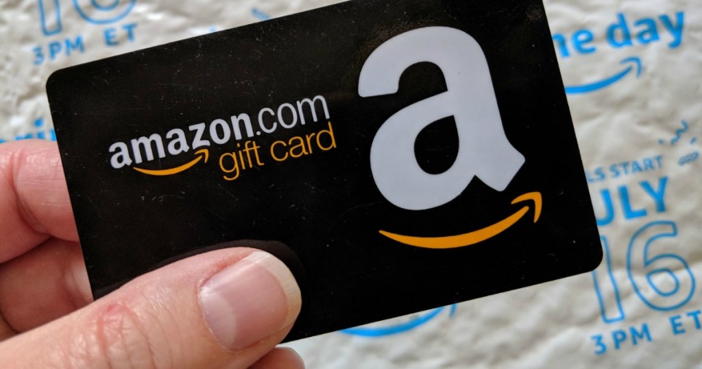 hand holding an Amazon gift card
