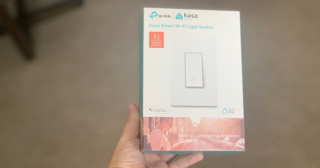 kasa smart switch in box in hand