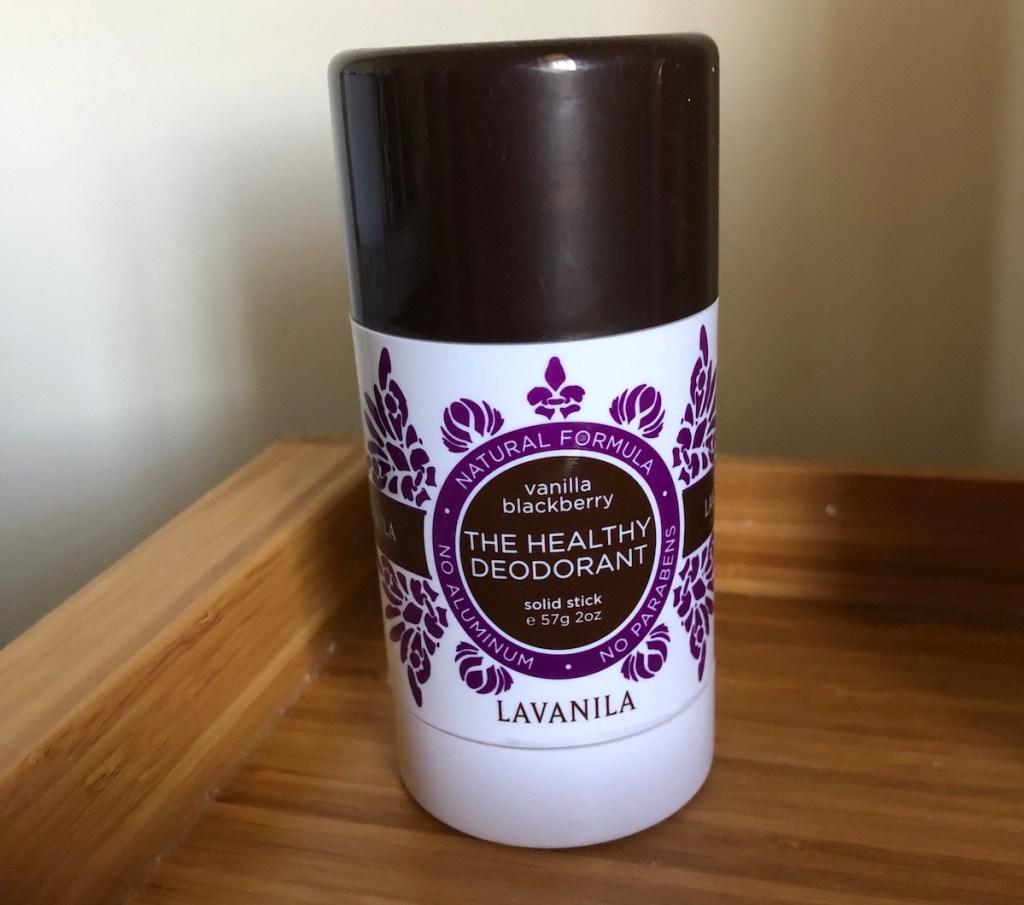 stick of lavanila vanilla blackberry natural deodorant on wood table