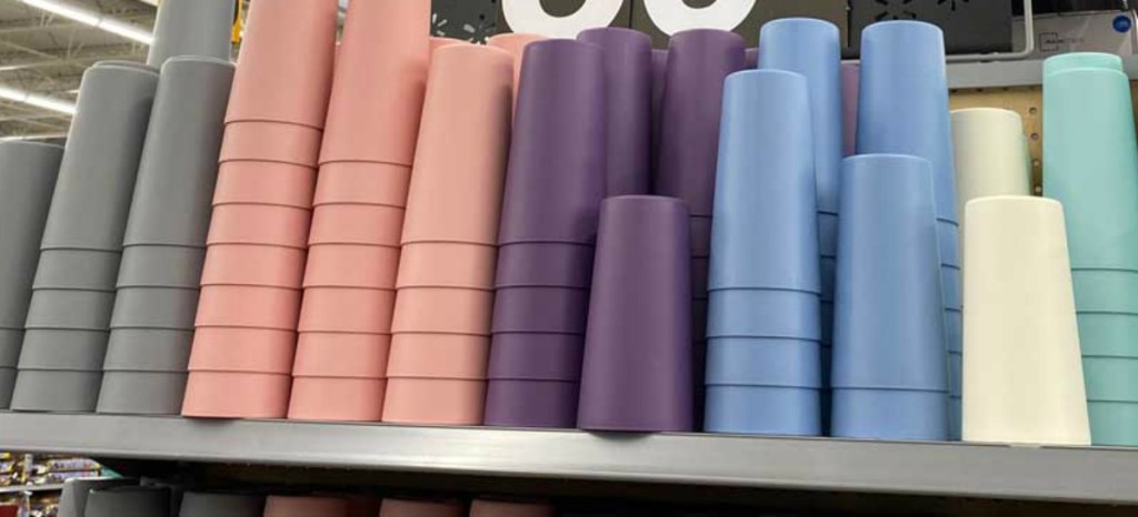 stacks of plastic cups on a store shelf