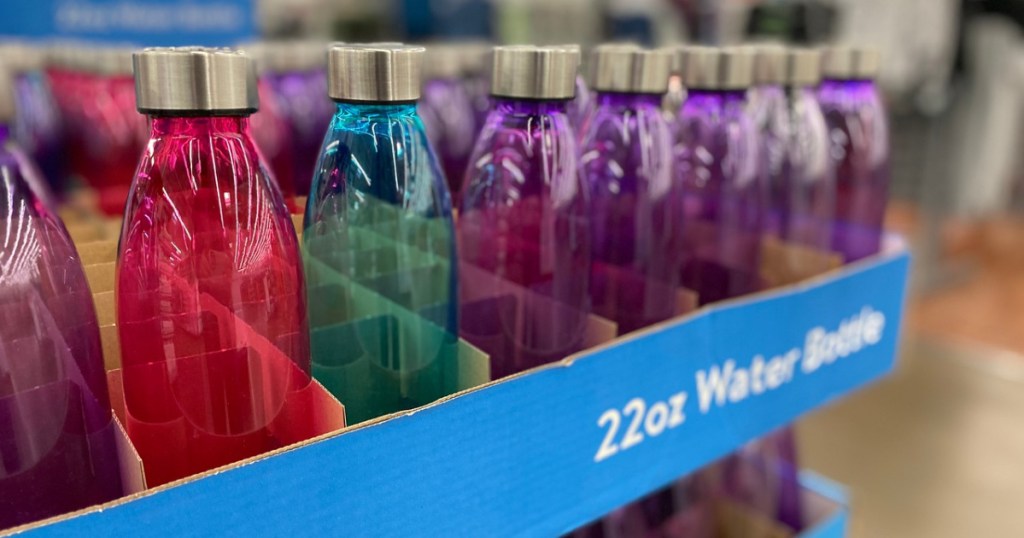 different colored water bottles on store display