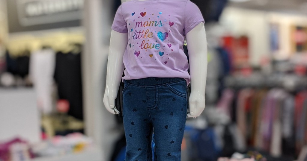 little mannequin in store on display showing toddler clothes
