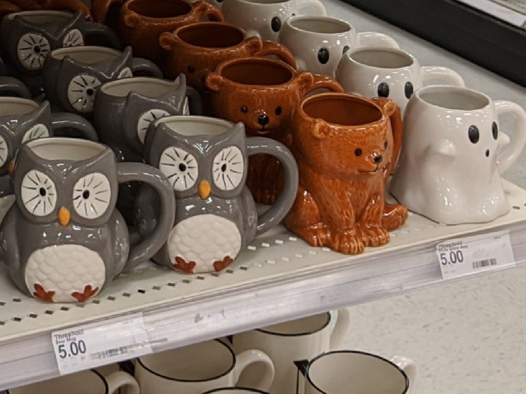 mug on store shelf that look like owls, bears and ghosts