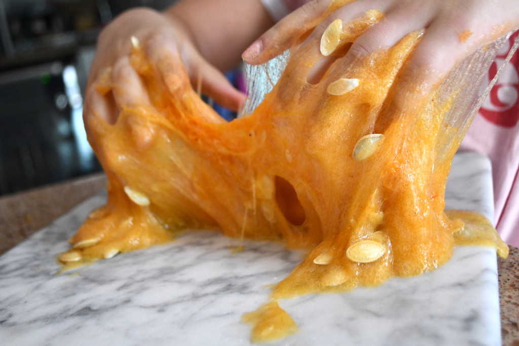 pumpkin slime guts in hand 