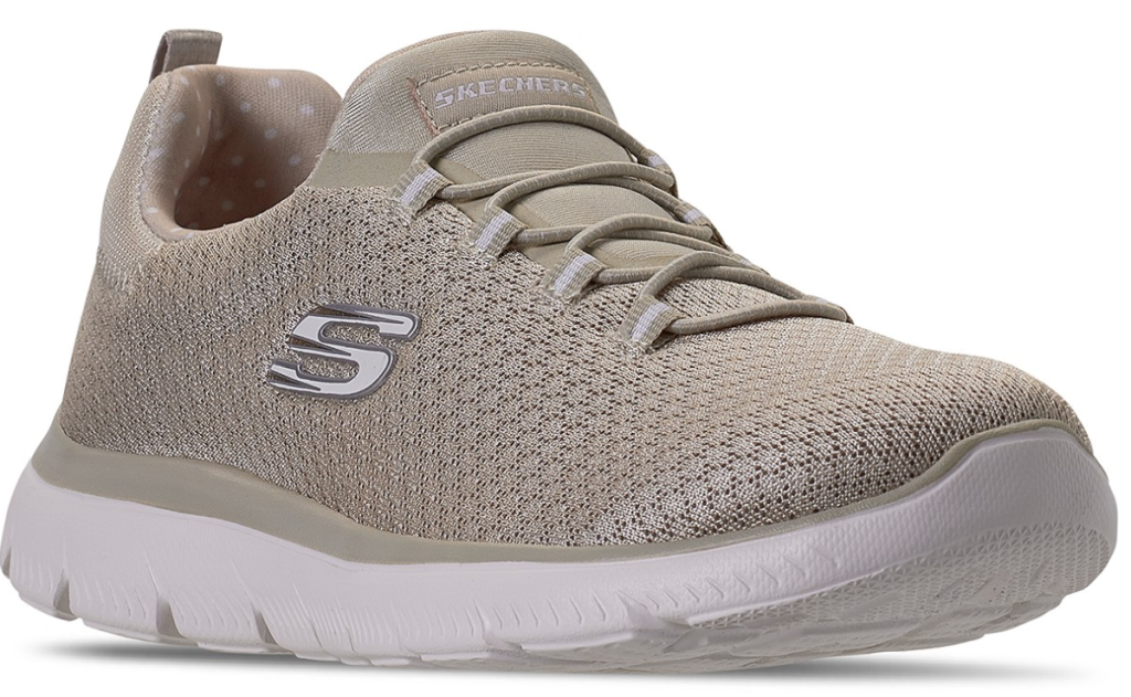 one shoe in light taupe with S on side