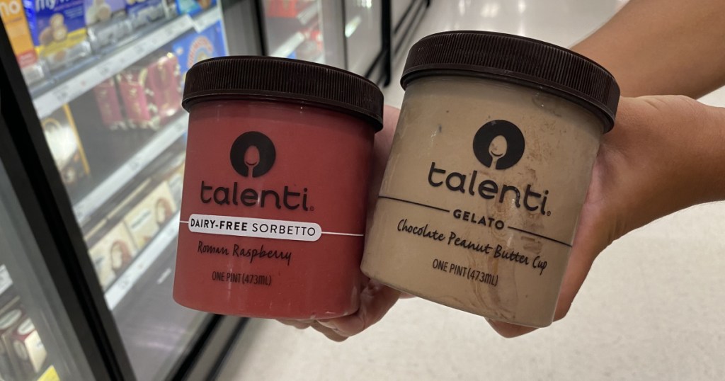 two jars of talenti gelato in hand 