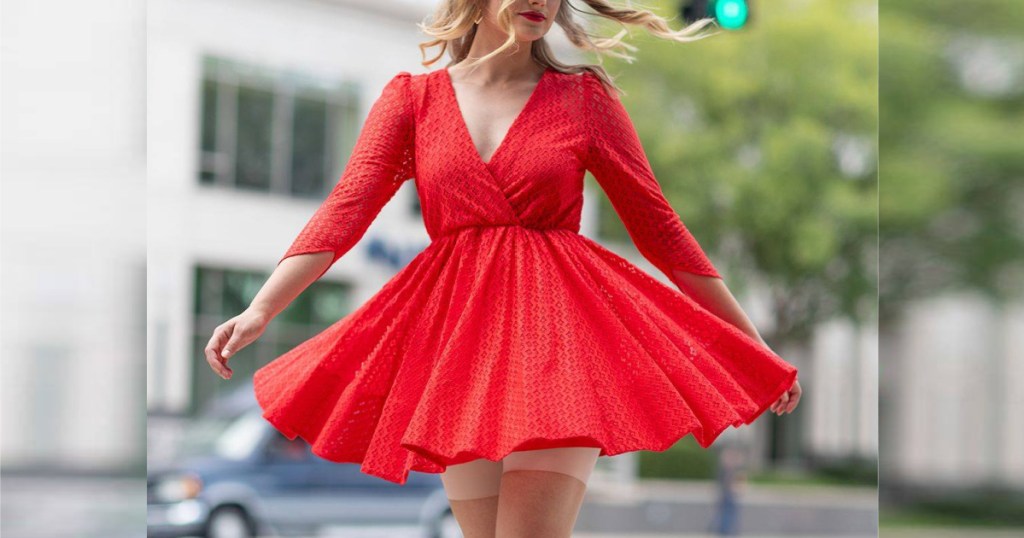 woman in red dress wearing spanx on street