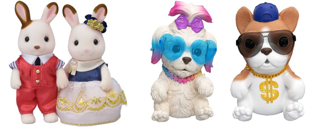 set if two calico critter bunnies and two singing dog toys