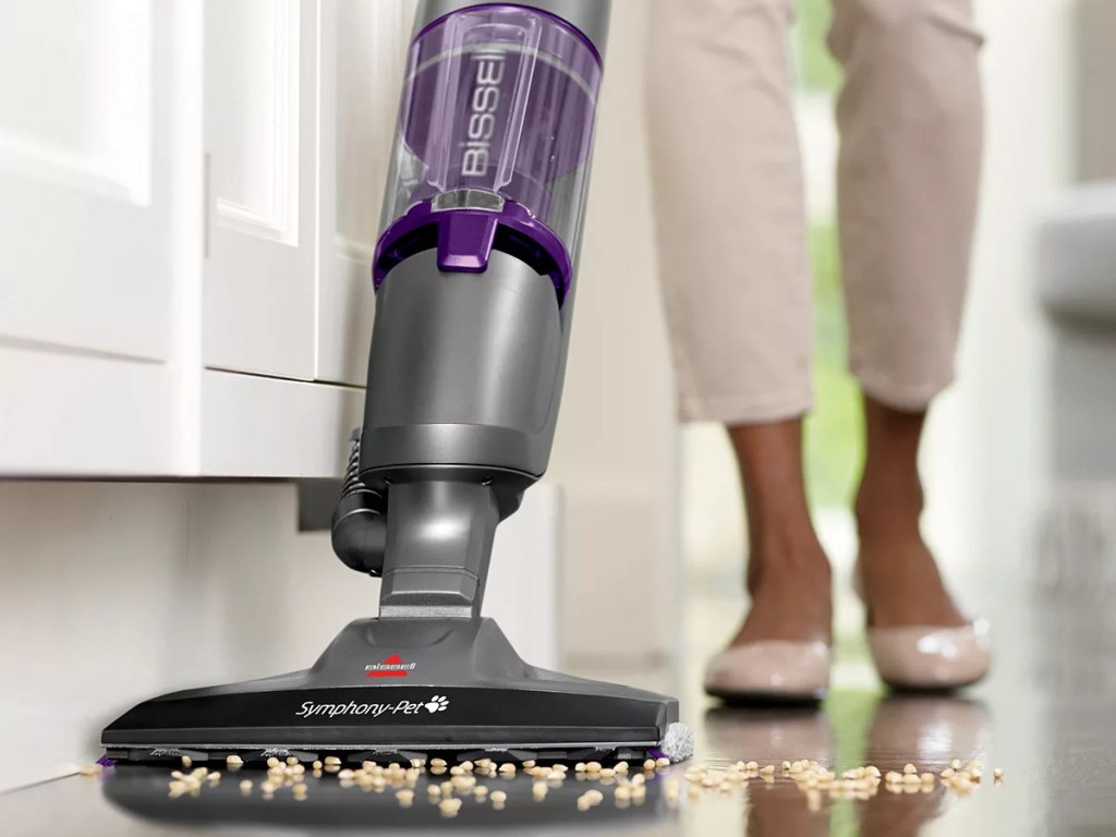 vacuum cleaning food on floor in home