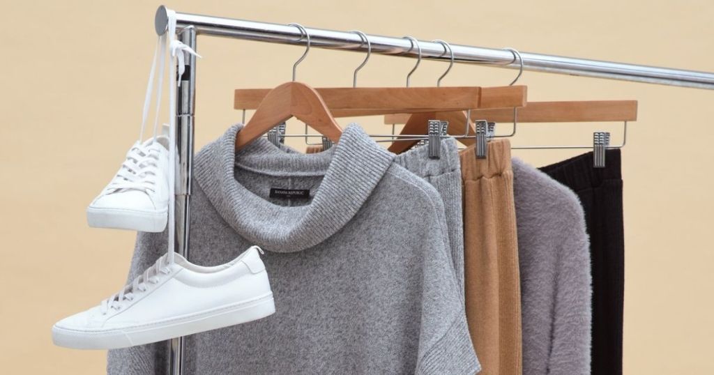 clothing on hangers on a rack