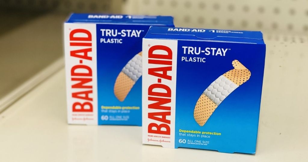 two boxes of band aids on shelf