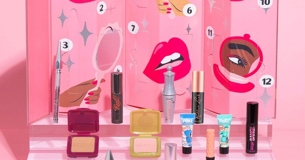 pink advent calendar with mini benefit cosmetics products in front of it