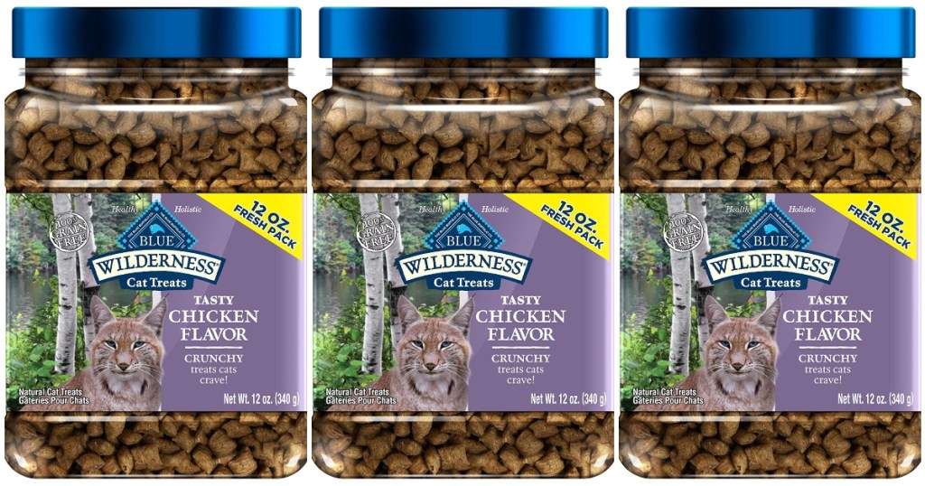 Three Containers of Blue Buffalo Wilderness Cat Treats. Plastic jars with blue lids.