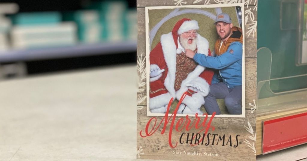 personalized Christmas card with man pulling Santas beard