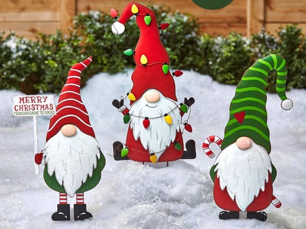 holiday Gnomes staked in snow