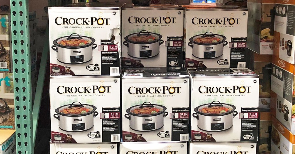 boxes of stainless steel crockpots stacked at Costco