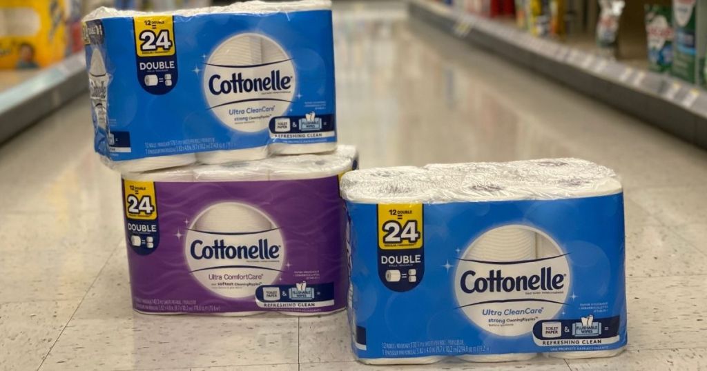 3 packages of Cottonelle Toilet Paper on floor of walgreens