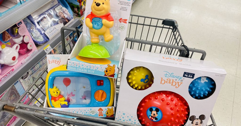 three disney baby toys in walgreens shopping cart