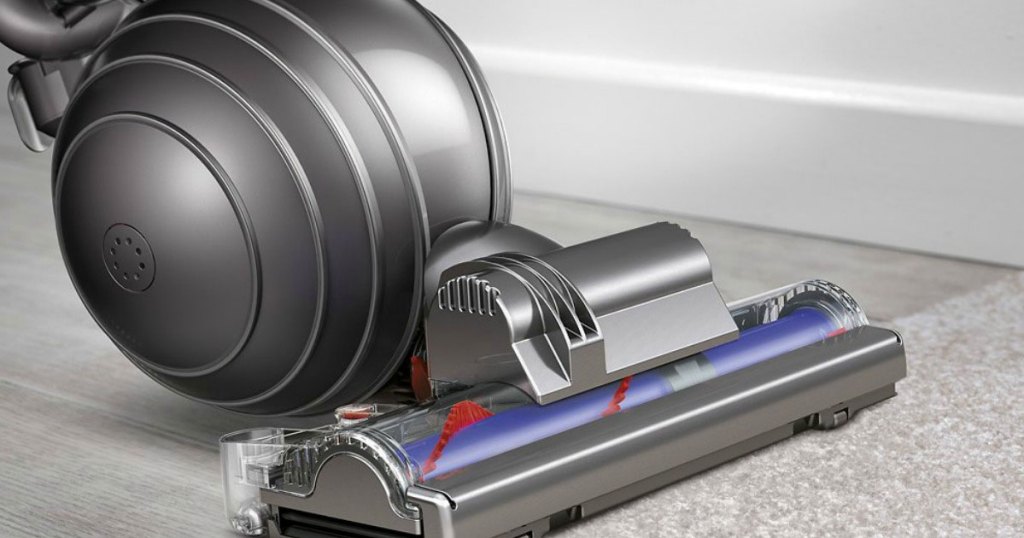 grey and purple dyson ball vacuum cleaning carpet