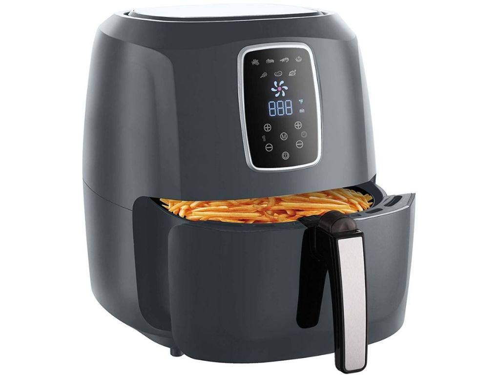 digital air fryer with basket partially opened revealing french fries
