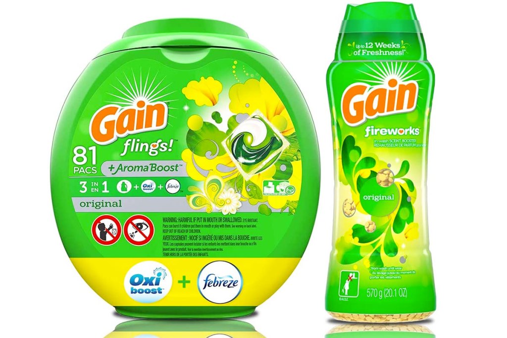 green container of gain flings laundry detergent and bottle of gain fireworks scent booster beads