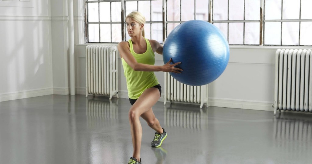 woman exercising with exercise ball