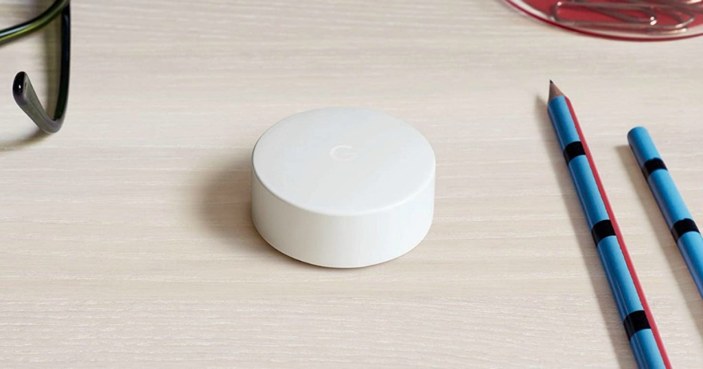 Google Nest thermostat sensor on a table top 