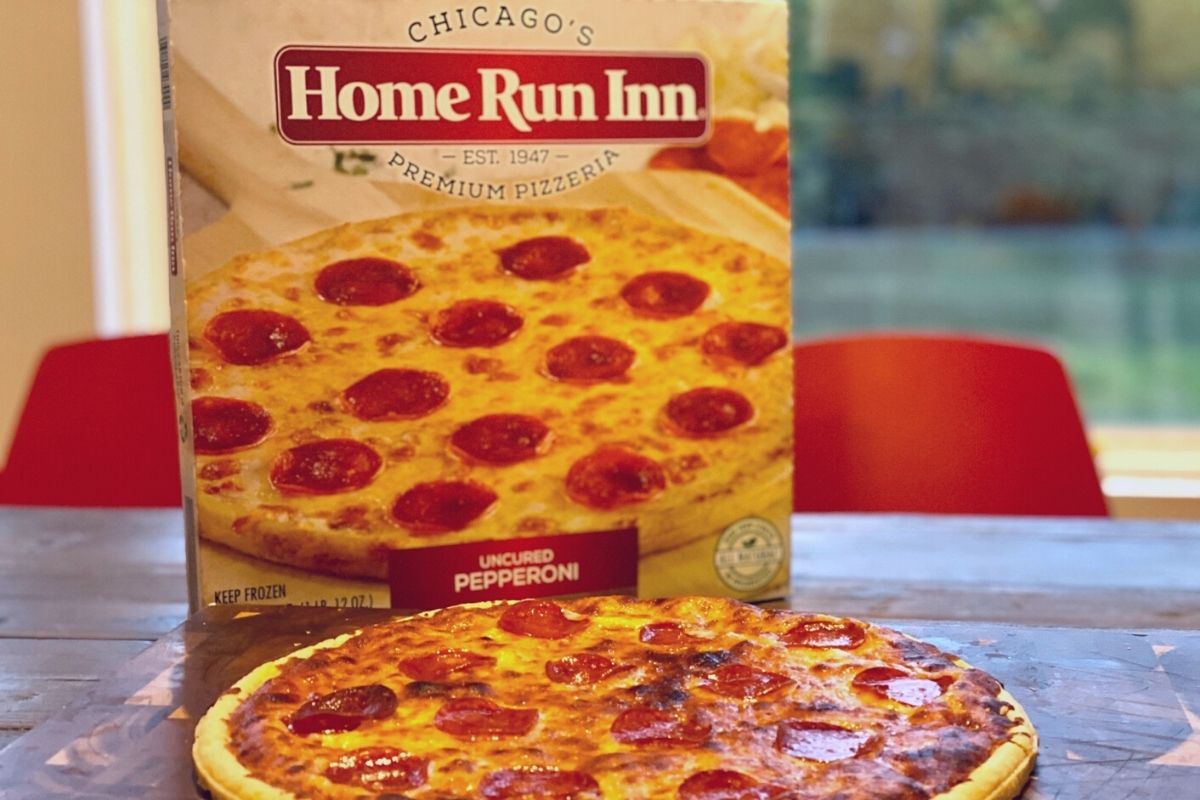 home run inn pizza on a table next to the box