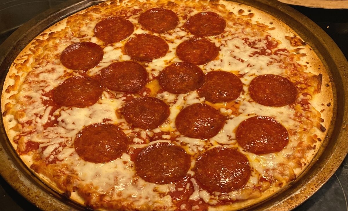 jack's pepperoni pizza on a pizza pan