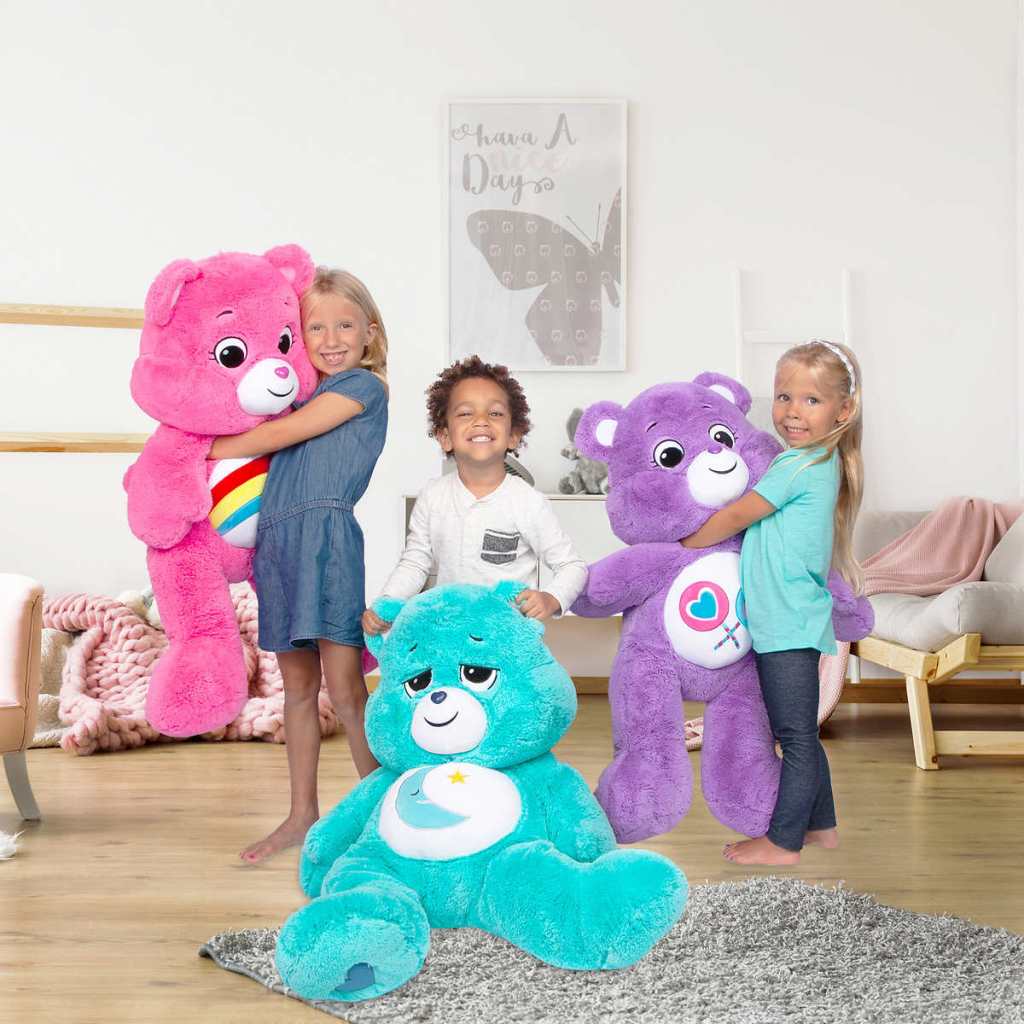 Kids with giant Care Bears