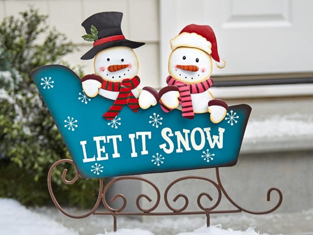 Let It Snow sleigh with snowmen riding along in sleigh