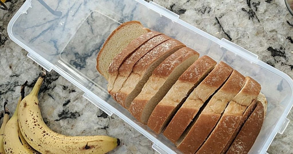 Lock & Lock Easy Essentials Pantry Bread Box and Divided Food Storage Container with bread inside container and banana next to it