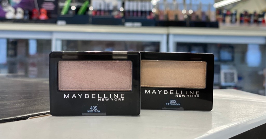 two single eyeshadows on counter in store