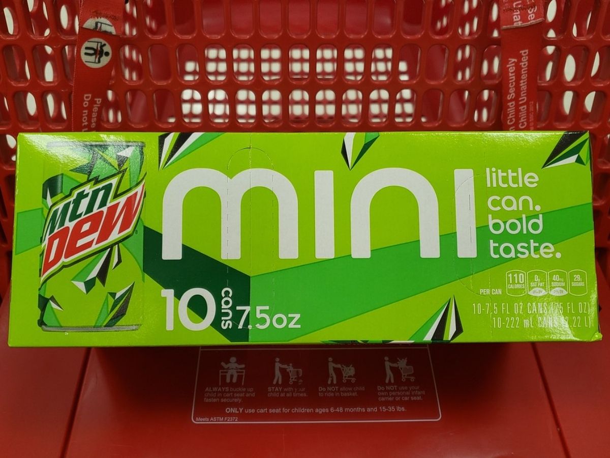 Case of Mountain Dew Mini Cansin front basket of shopping cart