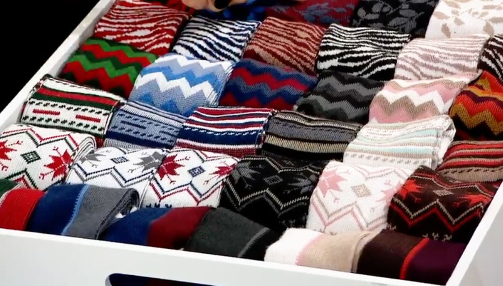 drawer full of pairs of printed socks
