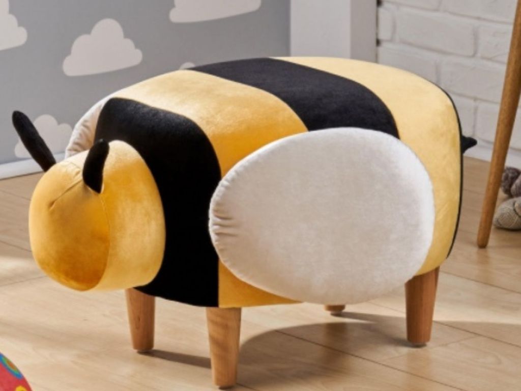 Upholstered bee ottoman