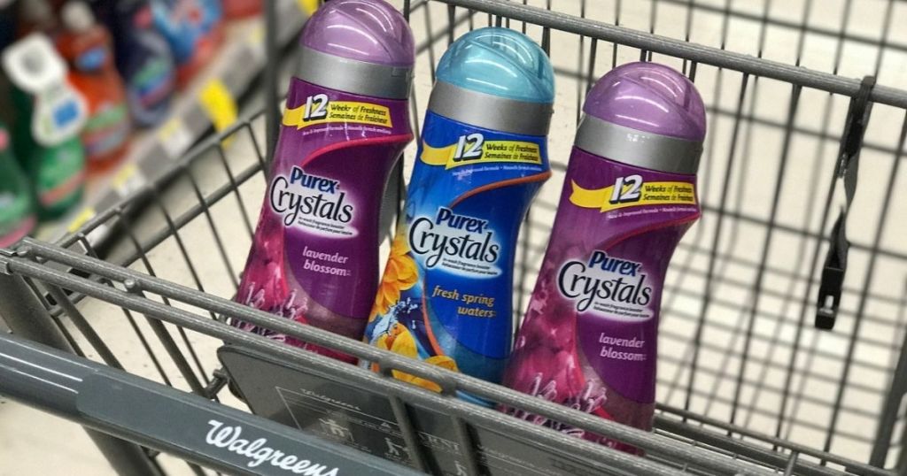 shopping cart with three bottles of Purex crystals in front basket