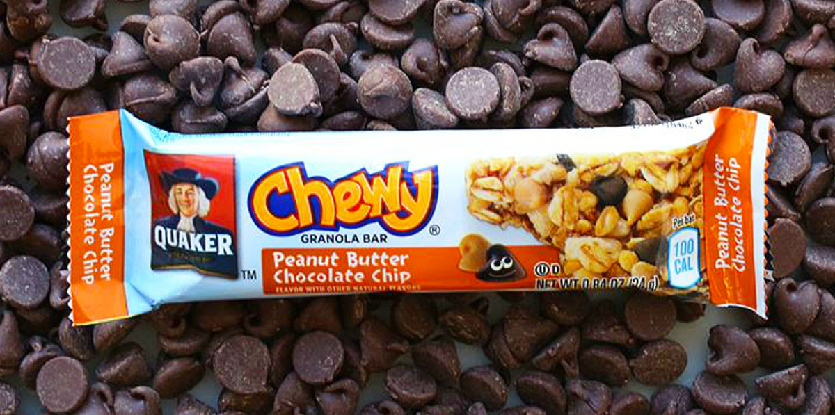 quaker chewy peanut butter chocolate chip flavor bar on top of chocolate chips