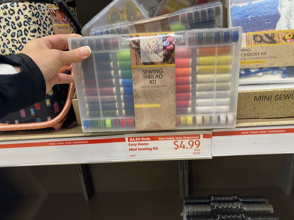 hand holding Sewing thread Kit at ALDI