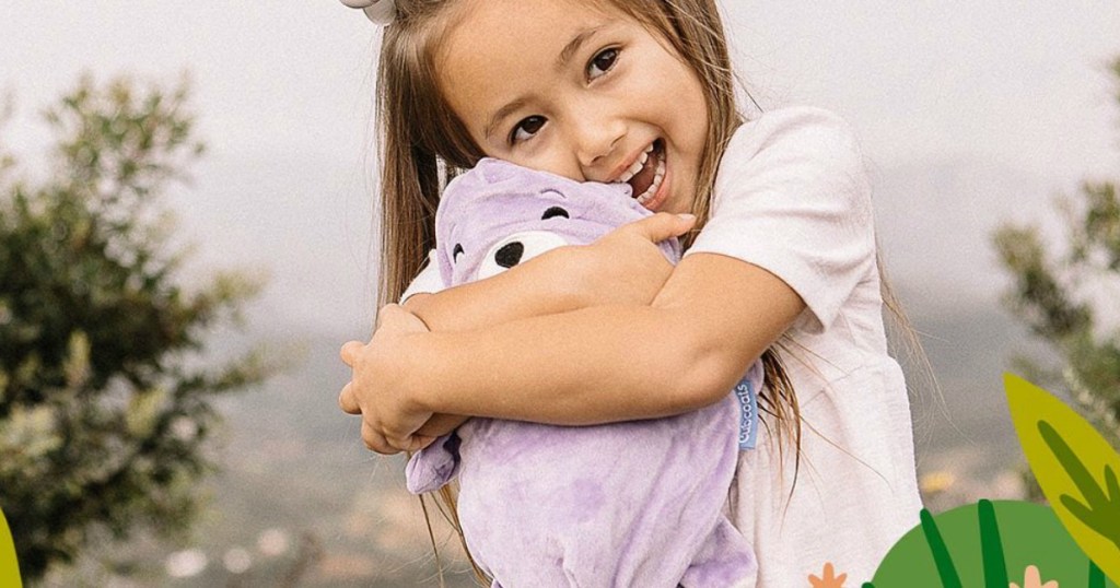 holding a stuffed animal