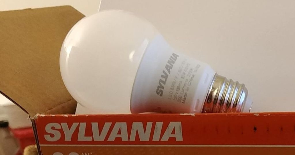 Sylvania light bulb sticking out of the top of the package