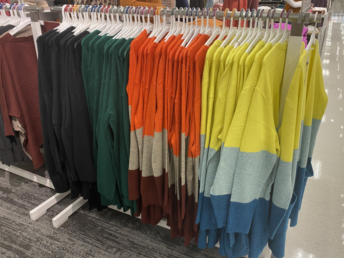 women's colorblock cardigans hanging on a target rack