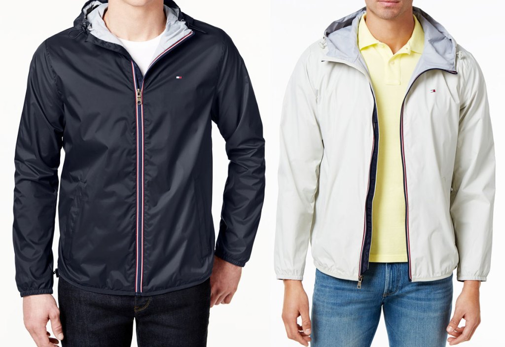 two men wearing zip up jackets in black and cream colors