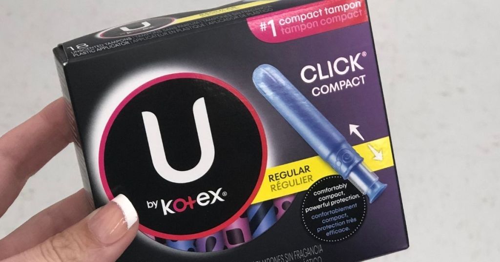 hand holding a box of U by Kotex tampons